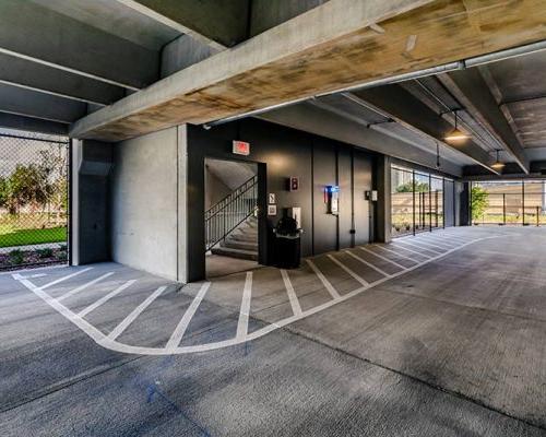 Photo of the bottom floor stairwell of the parking structure.